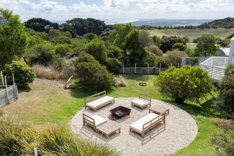 The fire pit circle on the lawn