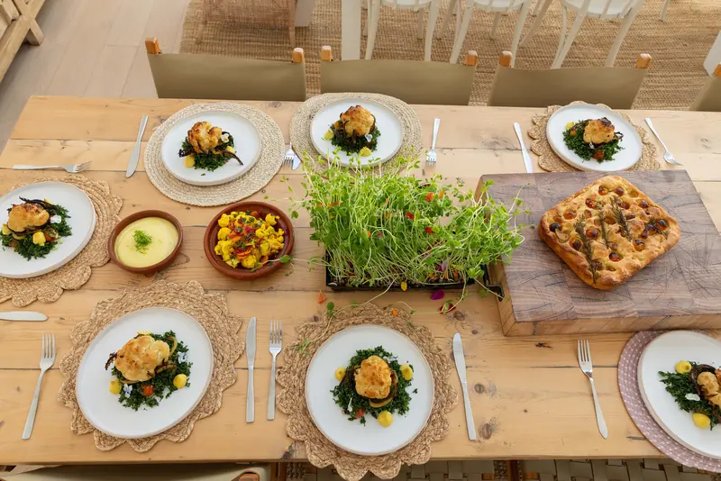 Lunch laid out on the long timber table