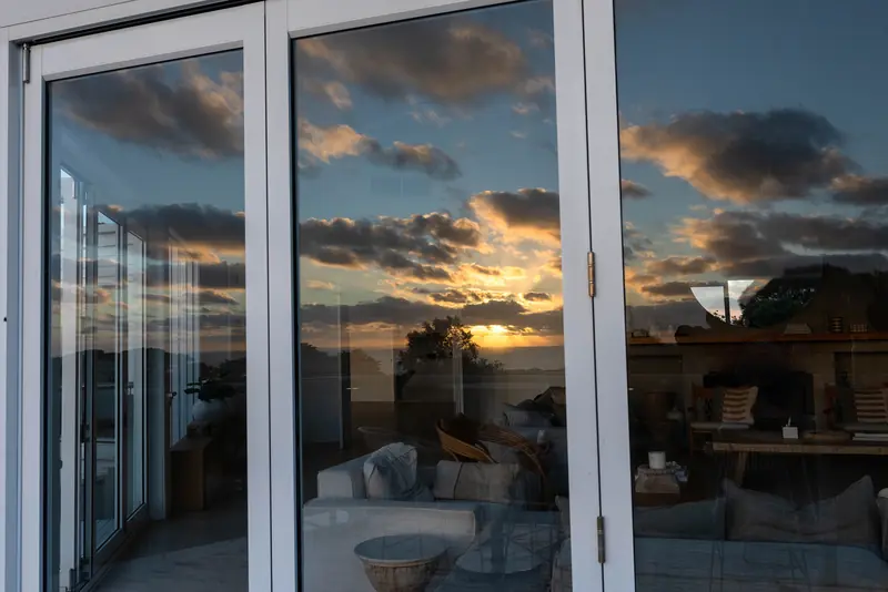 Sunset reflected in the glass doors