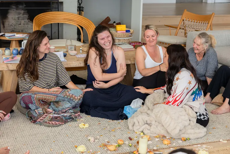 Guests laughing in the circle