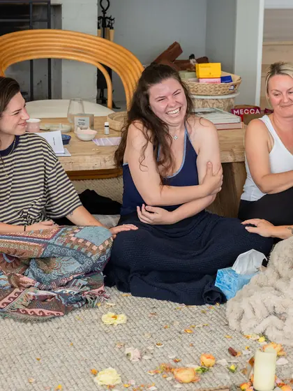 A guest laughing in the circle